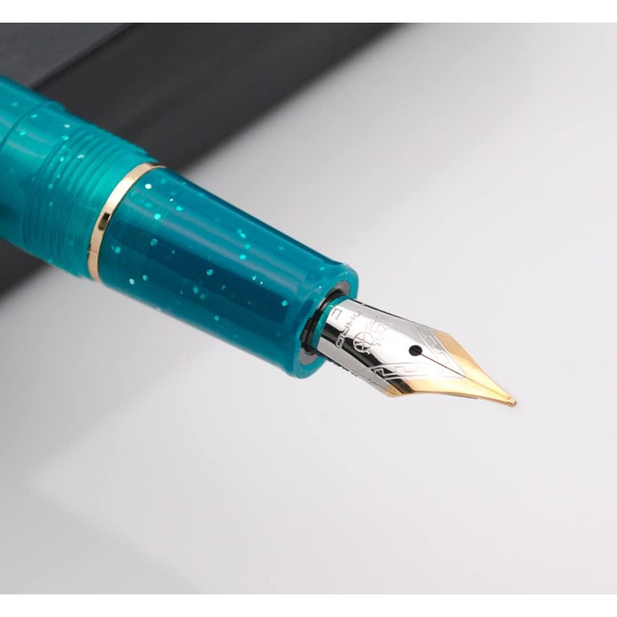 Caneta Tinteiro Jinhao 82 T Fluorescent Peacock Blue - Ponta EF Jinhao